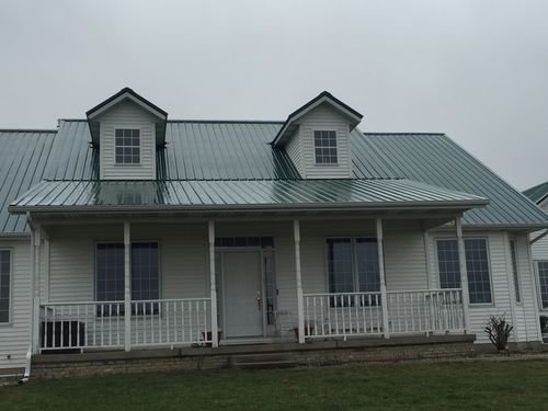 Modern Home with Metal Roof Protection